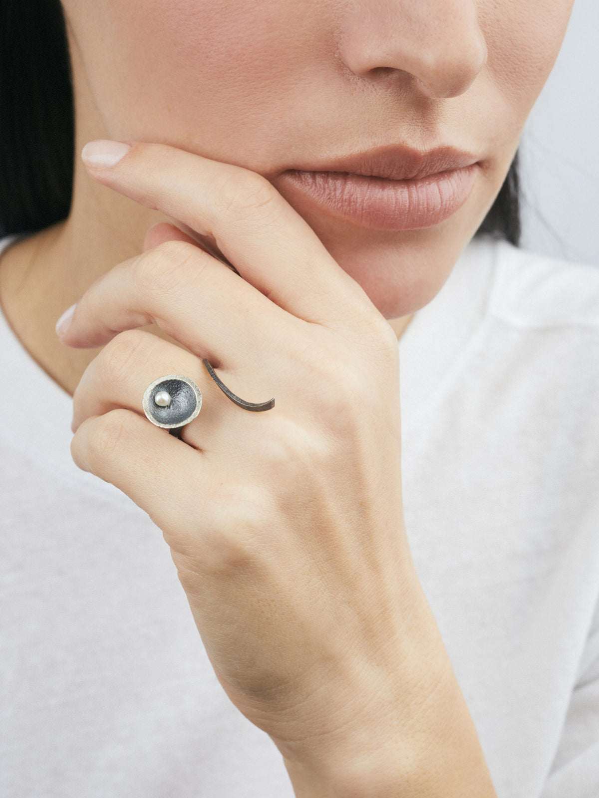 Model wearing Silver Ring with White Pearl