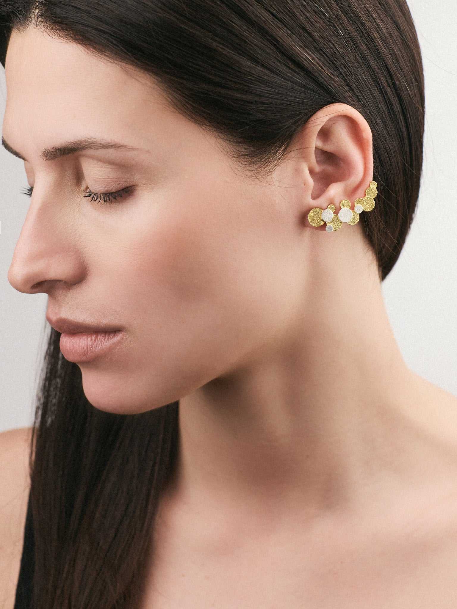 Model wearing Silver Earrings with a Gold plated finish