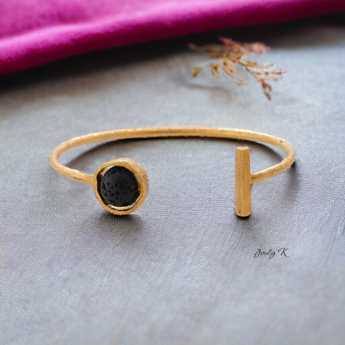 Silver Bracelet with a Gold plated finish and a Lava gemstones