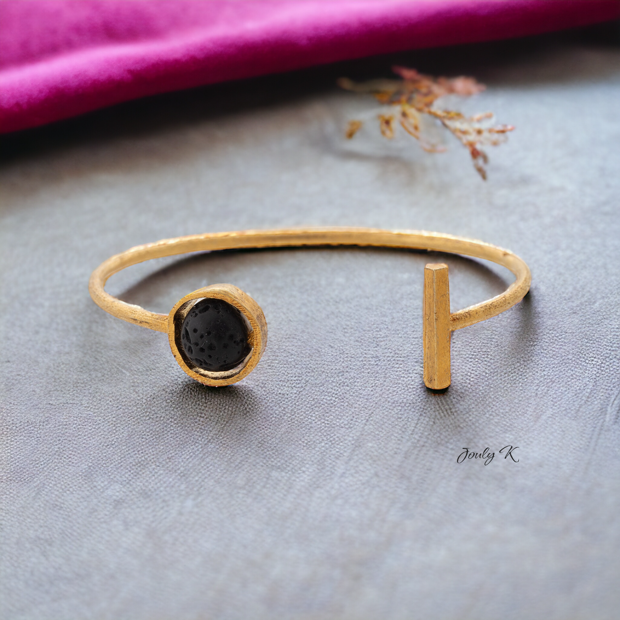 Silver Bracelet with a Gold plated finish and a Lava gemstones