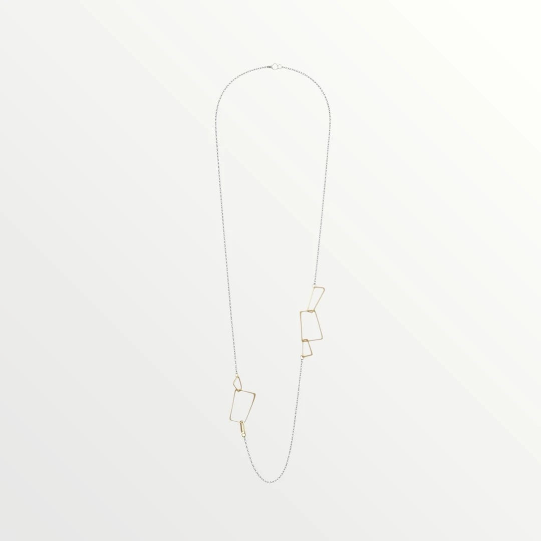 Jouly K Geometric Link Long Necklace for women, silver-tone chain with gold geometric shapes.