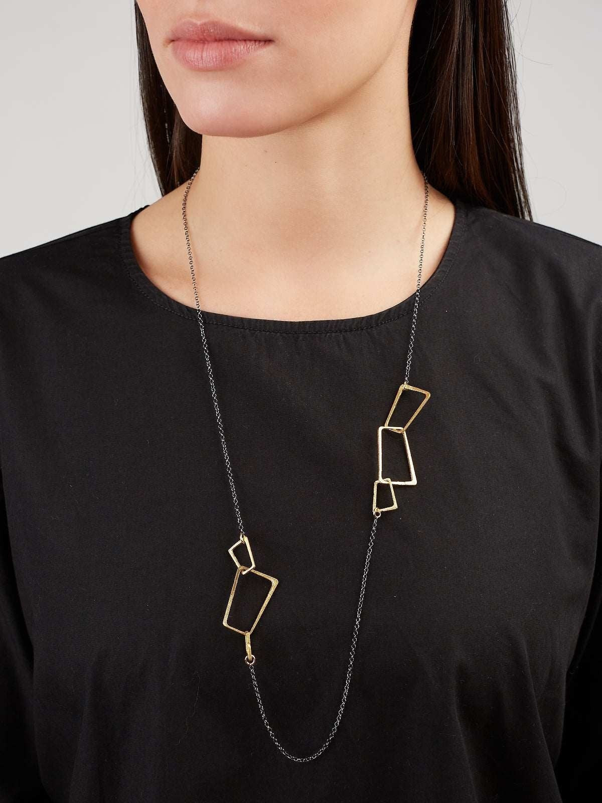 Jouly K Geometric Link Long Necklace for women, silver-tone chain with gold geometric shapes.