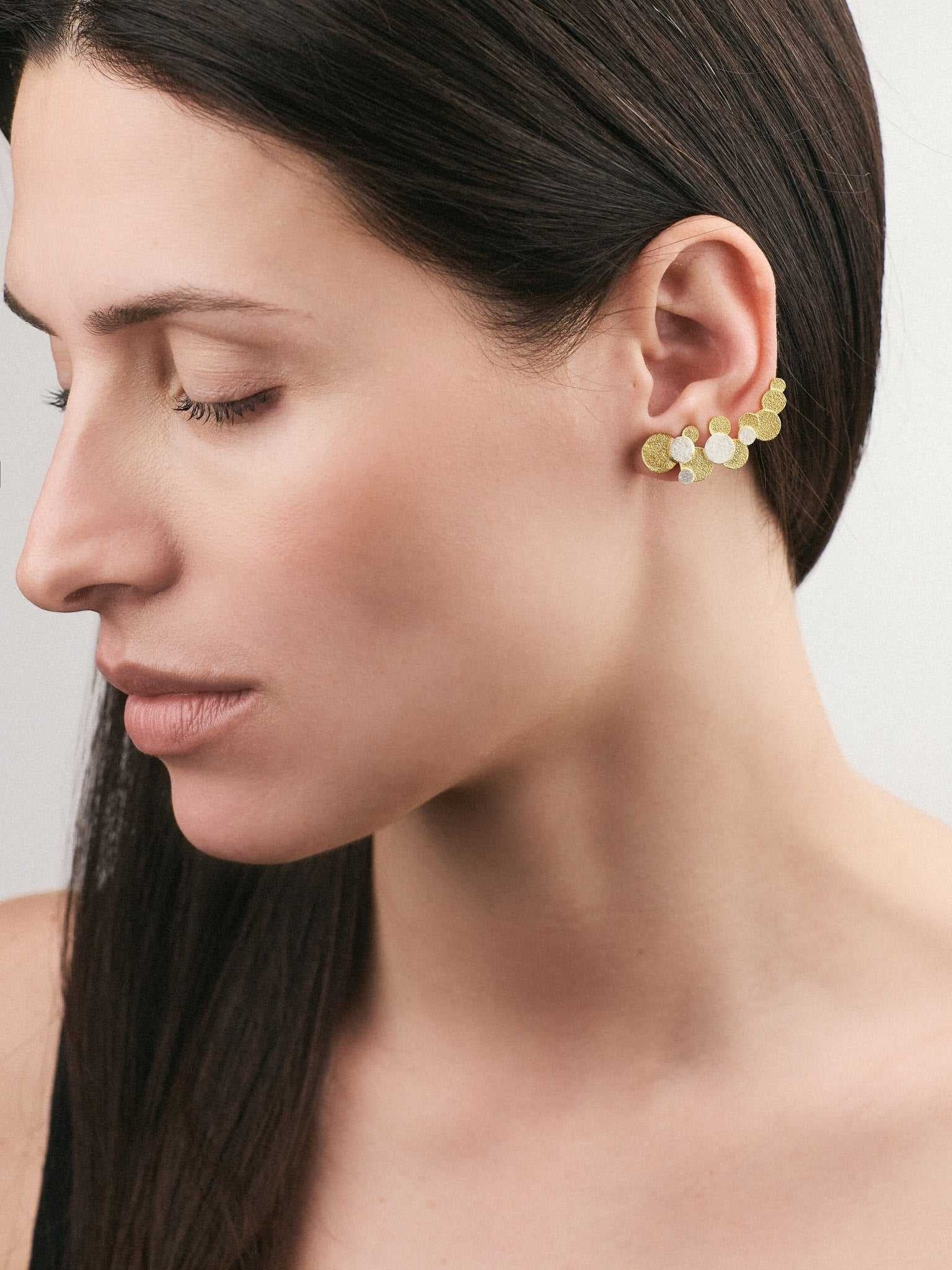 Jouly K handmade silver earrings with 22ct gold plated finish, featuring a cluster of textured circles.