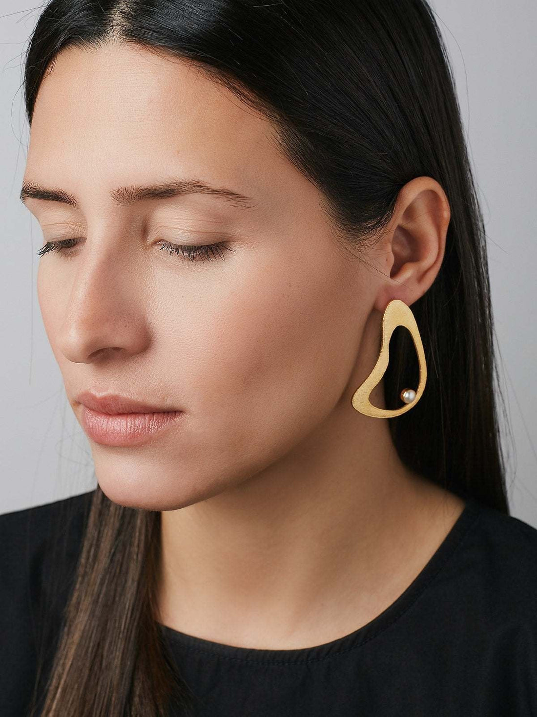 Jouly K handmade gold plated earrings with white pearl accent. Abstract shape, 22ct gold plated silver 925.