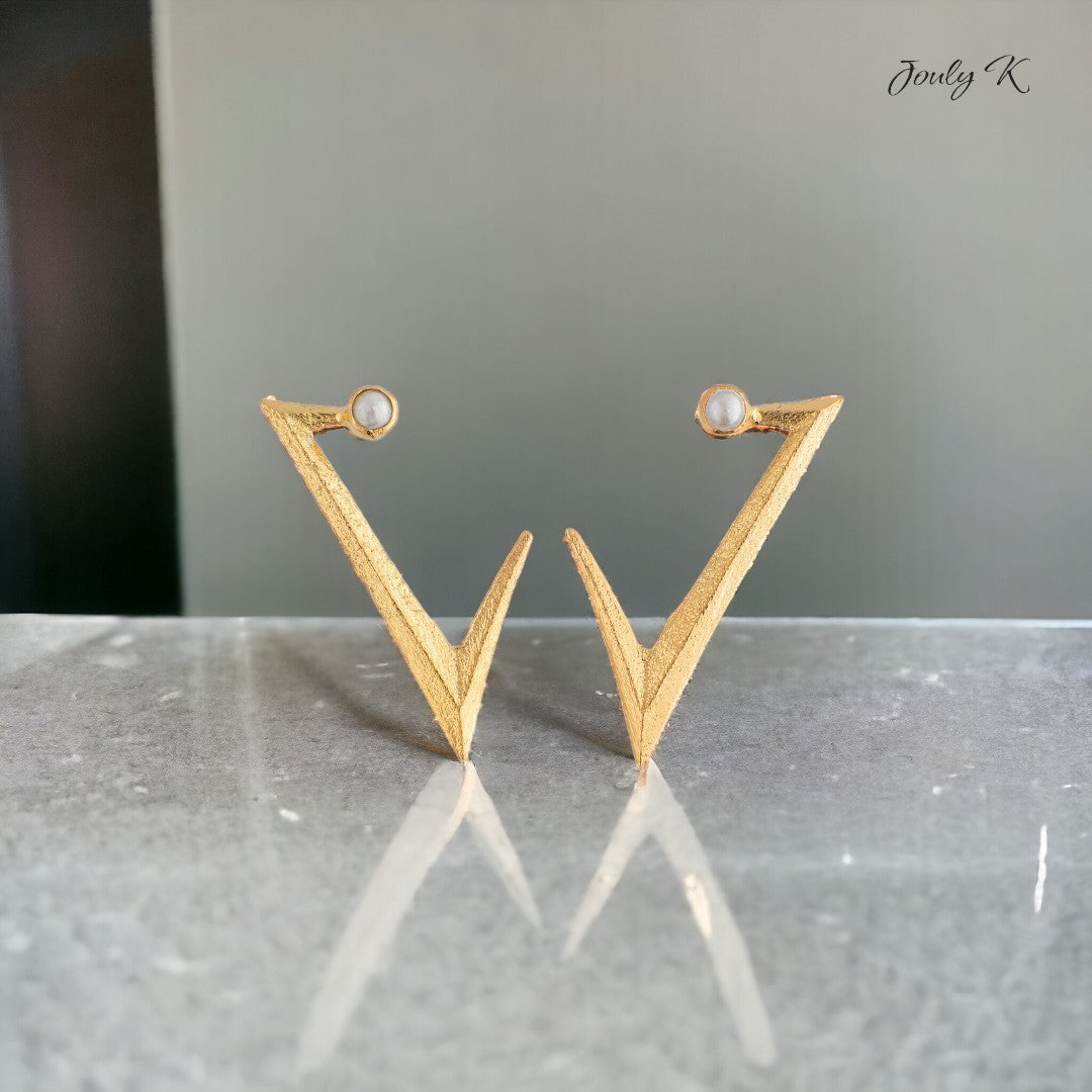 Jouly K gold plated V-shaped earrings with white pearls. Handmade silver 925 earrings with a luxurious finish.
