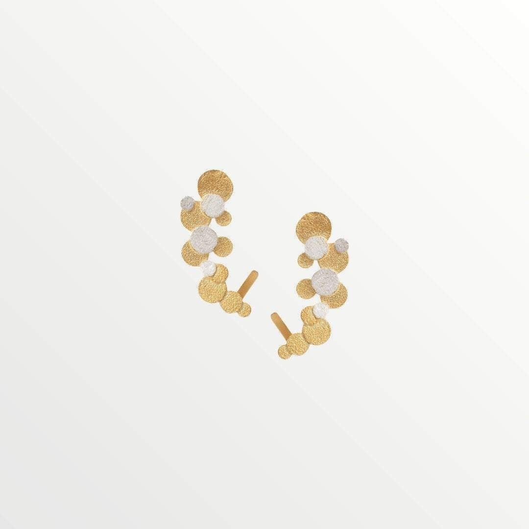 Jouly KHandsmade silver earrings with gold plated finish, featuring a cluster of circular elements in gold and silver tones.