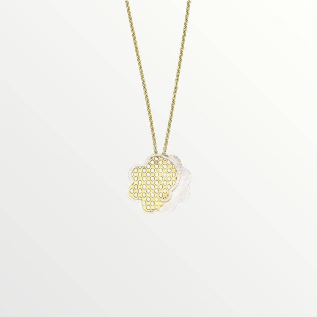 Jouly K handmade silver necklace with gold plated finish, featuring a layered clover-shaped pendant with a honeycomb pattern.