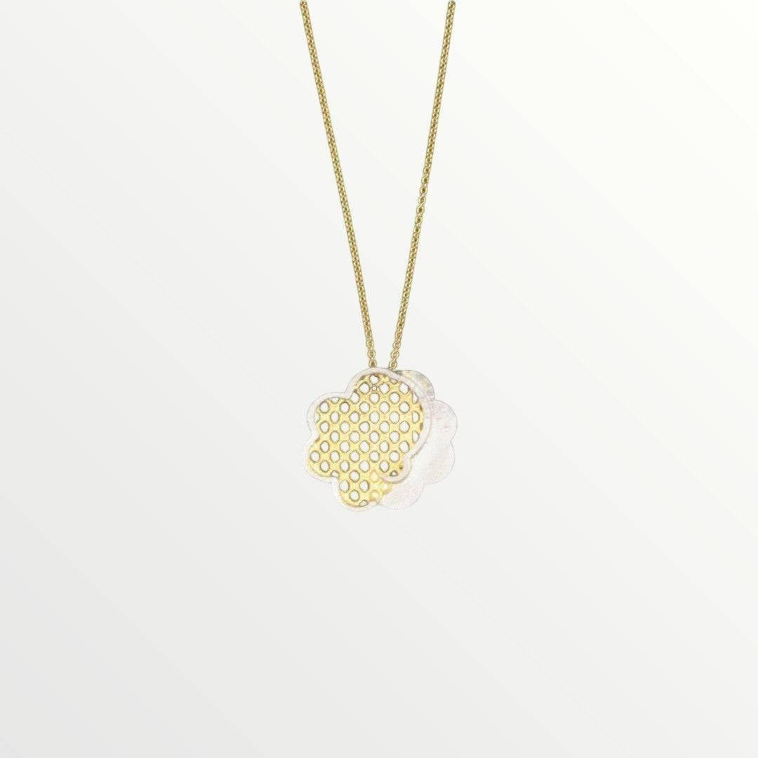 Jouly K handmade silver necklace with gold plated finish, featuring a layered clover-shaped pendant with a honeycomb pattern.