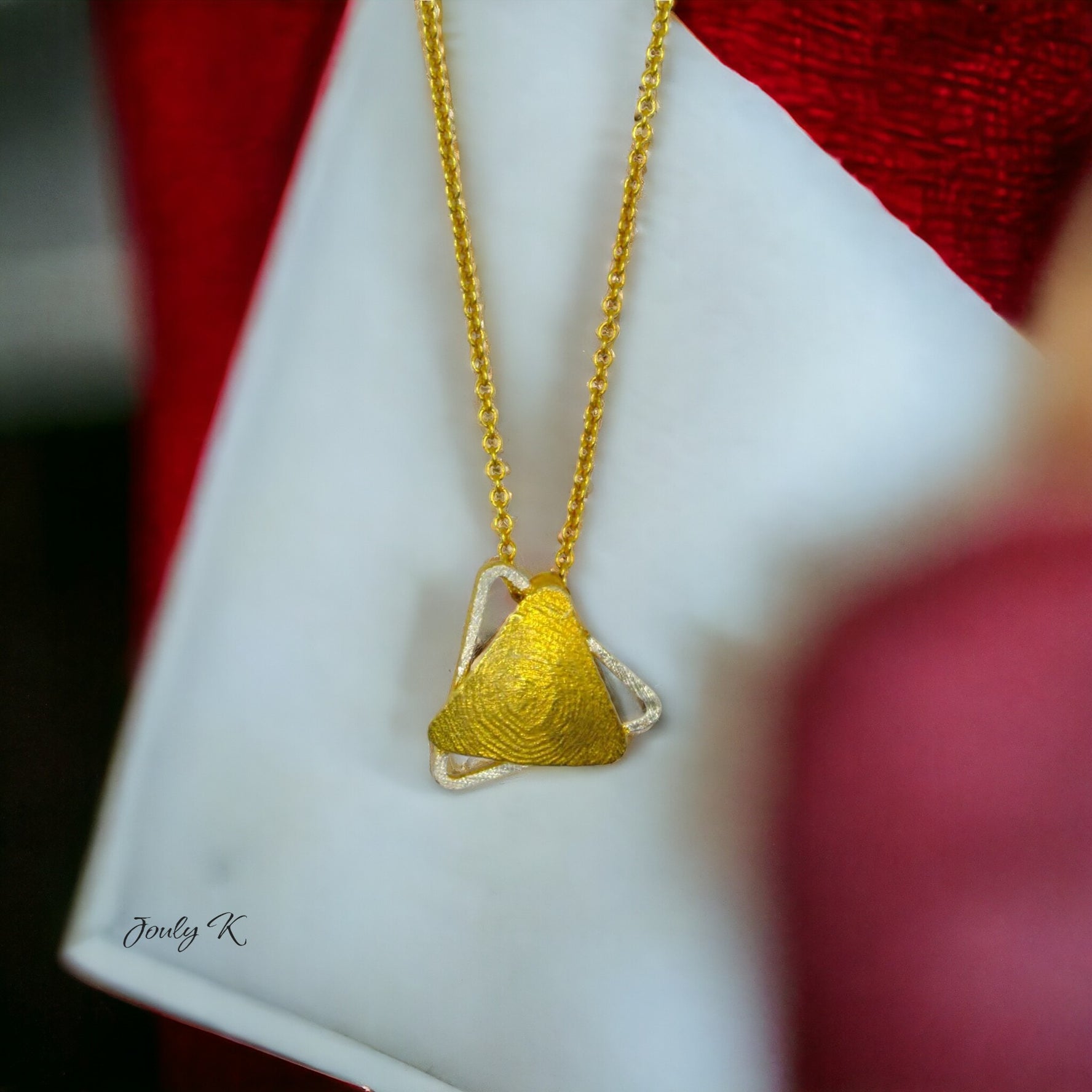Jouly K handmade silver necklace with 22 ct gold plated finish, featuring a textured triangular pendant.