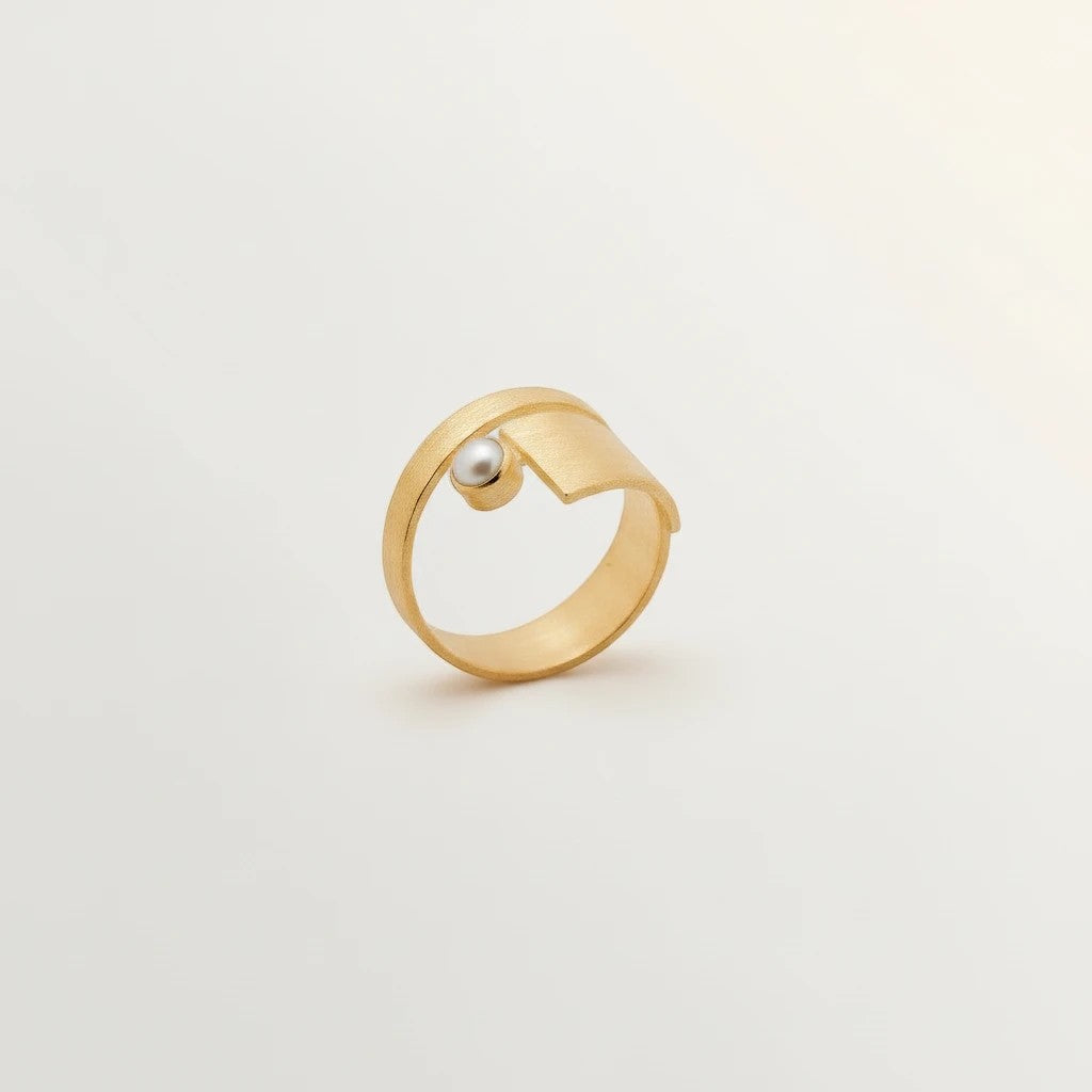 Jouly K Modern gold ring with pearl accent, brushed gold finish, open-ended adjustable band.