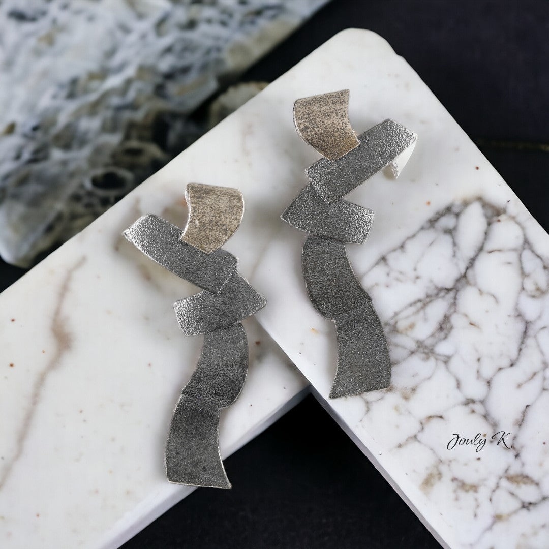 Jouly K handmade silver 925 earrings with an oxidized finish, abstract design, 2.7 cm W x 5.7 cm L.