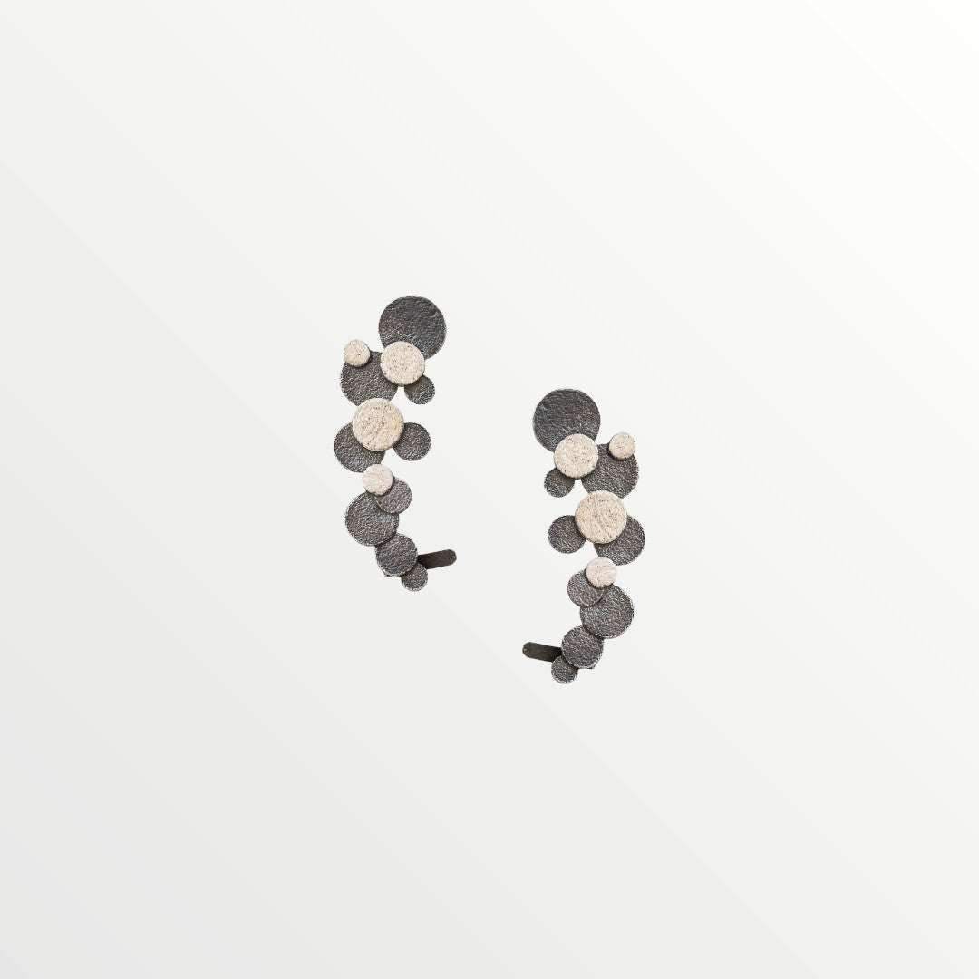 Jouly K handmade silver 925 earrings with oxidized finish and textured circles.