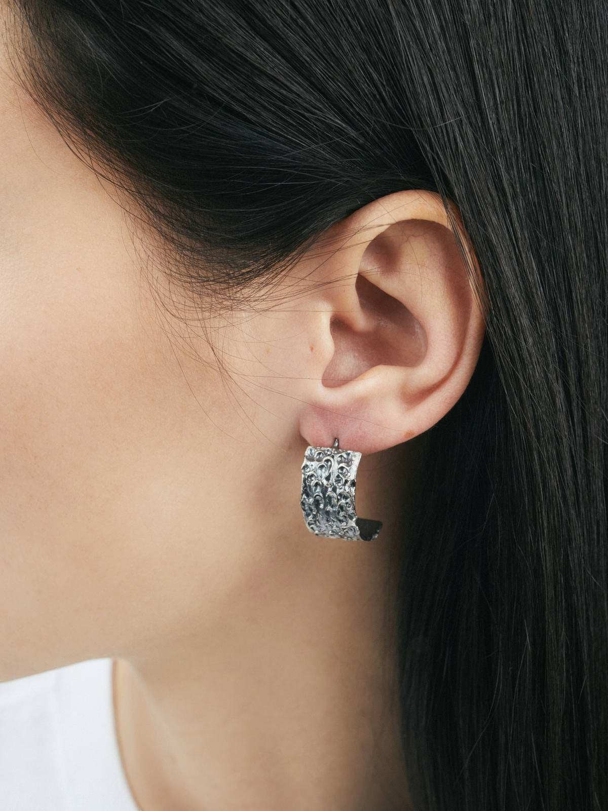 Jouly K Silver 925 earrings with an oxidized finish and intricate textured design.