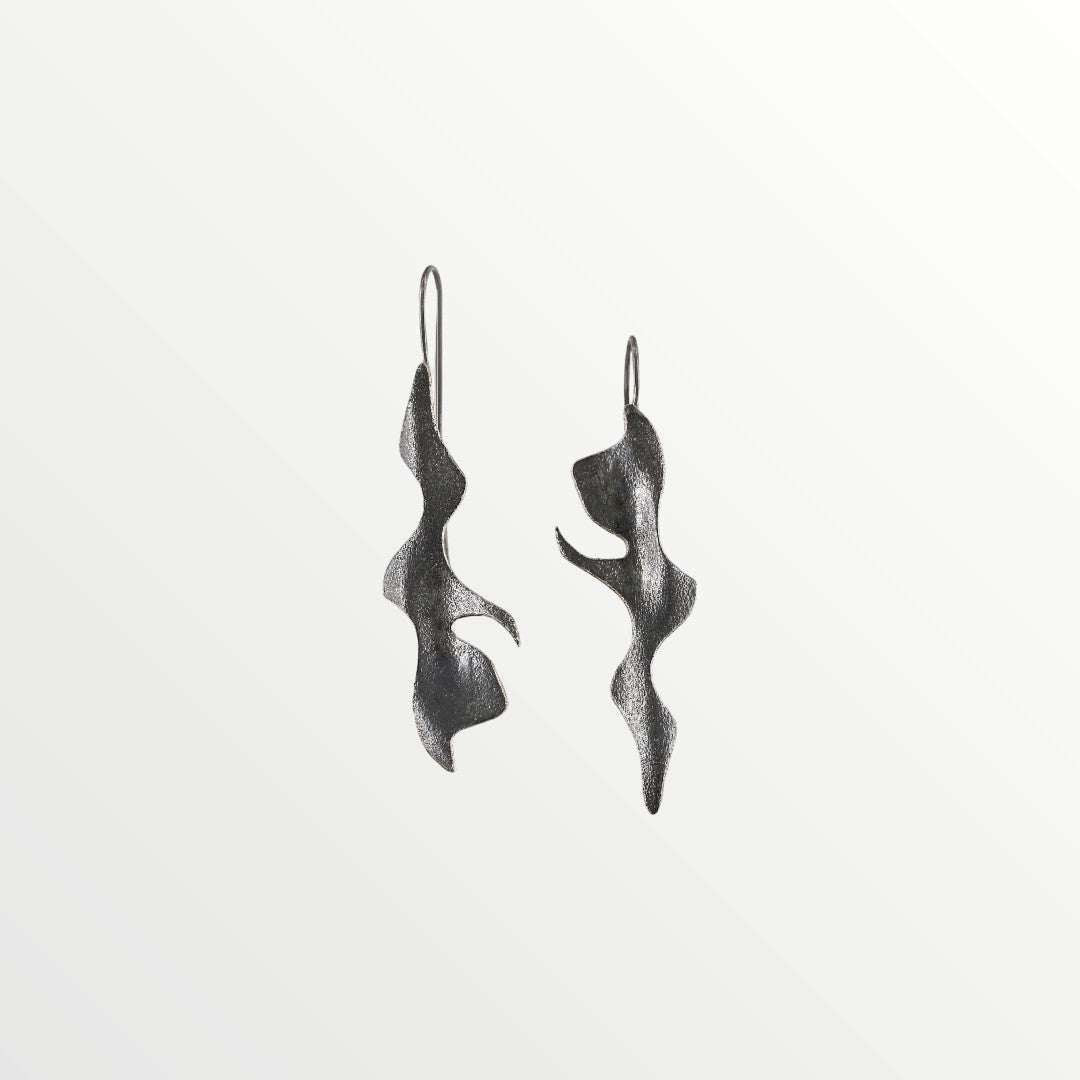 Jouly K handcrafted silver 925 earrings with an oxidized finish, featuring a unique wavy, abstract design.