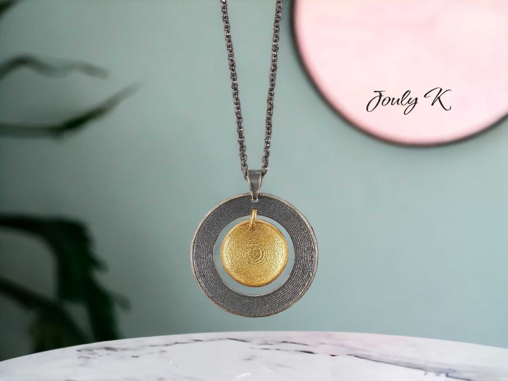 Jouly K oxidized sterling silver necklace with gold-plated textured disc pendant. Adjustable 40-45cm chain.