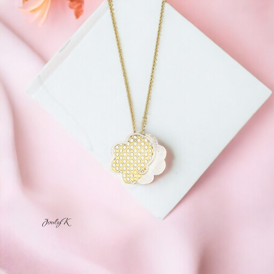 Jouly K handmade silver necklace with gold plated finish, featuring a layered flower pendant with a honeycomb pattern.