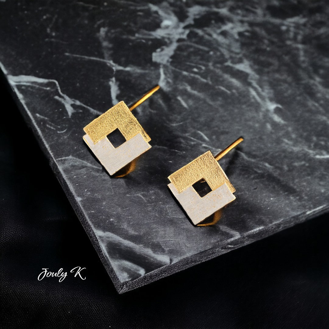 Jouly K handmade silver earrings with gold plated finish, featuring a geometric square design with a cutout.