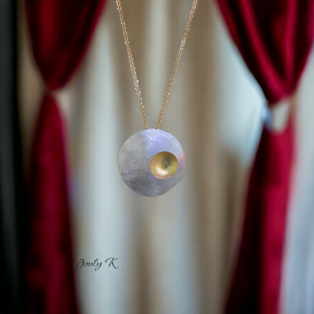 Jouly K silver necklace with gold plated finish, oxidized texture, and a unique circular pendant.