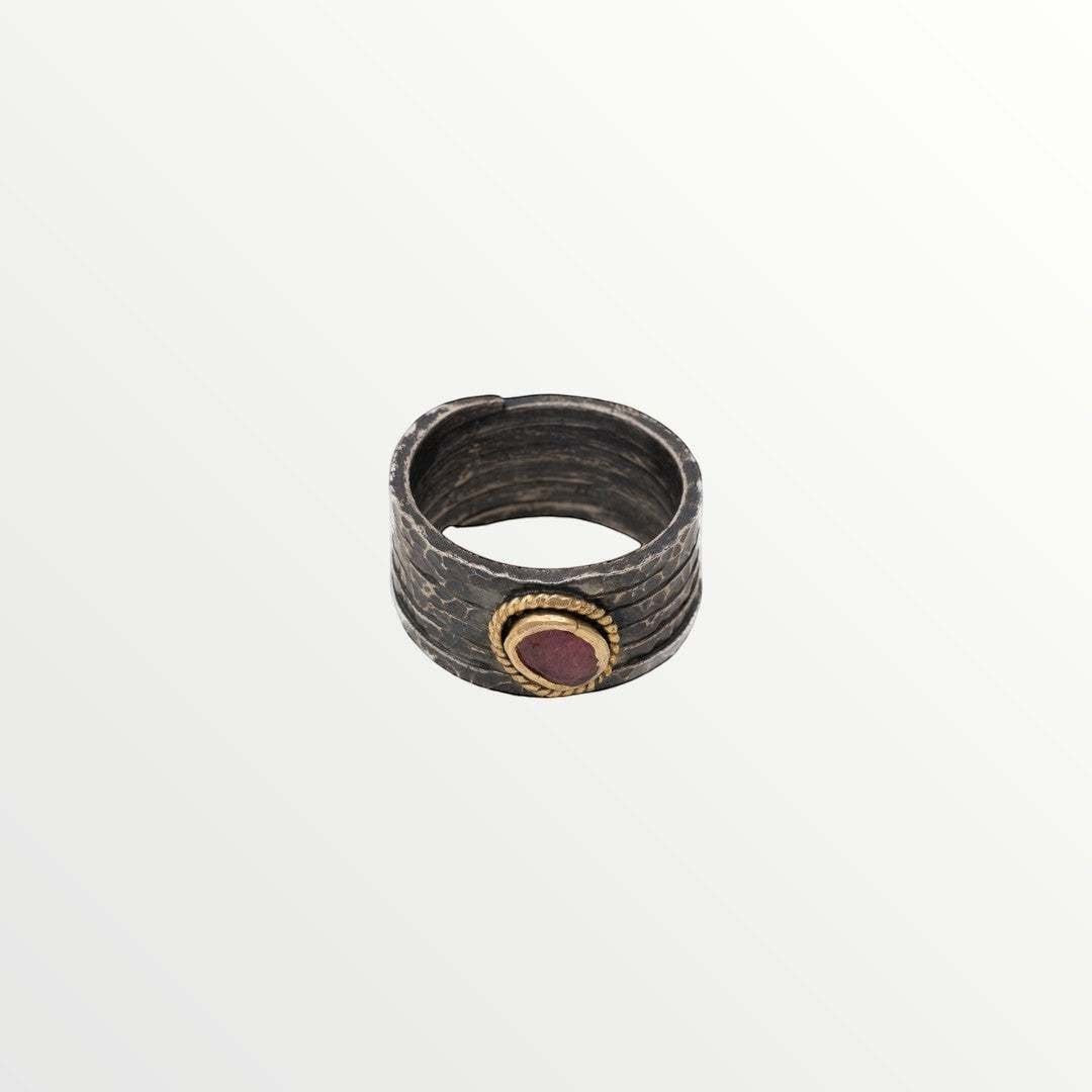 Jouly K textured band ring with red gemstone accent and gold-tone braided detail on oxidized silver-tone band.